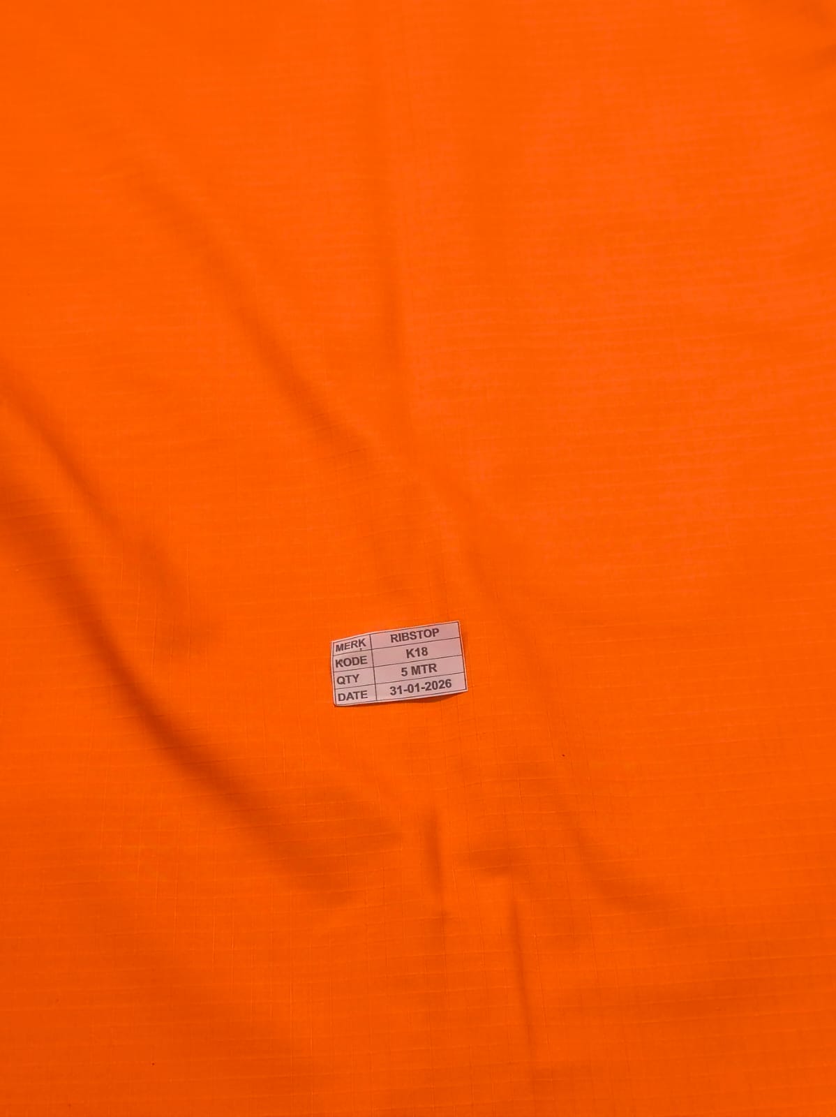 Gambar 1. Ribstop Drill Kode K018 Warna Orange BASARNAS Part 1